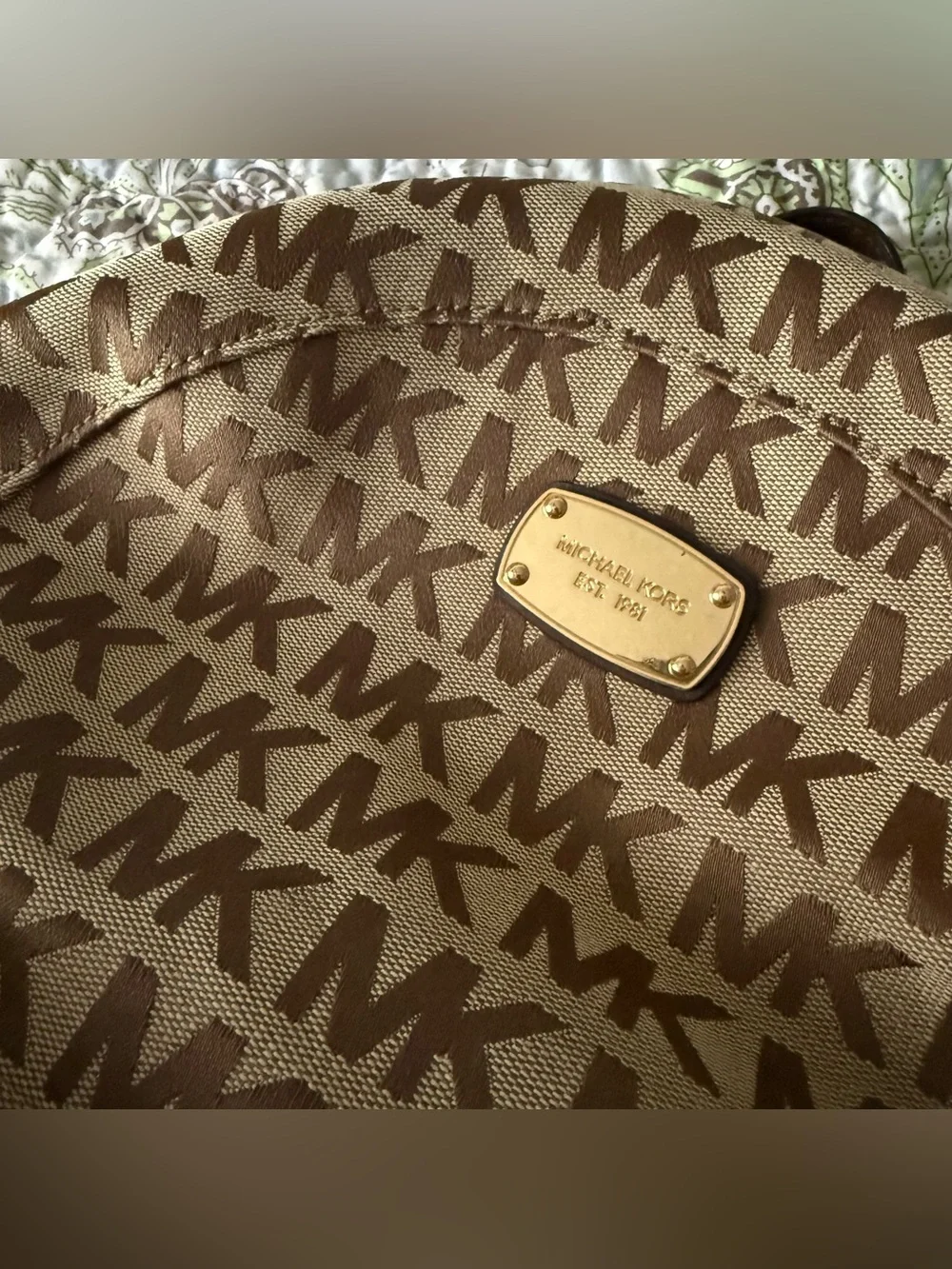 Michael Kors Monogram Logo Backpack with Gold Tone Hardware and Faux Leather Str